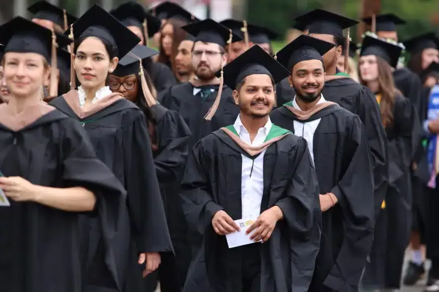 smiling students at graduation